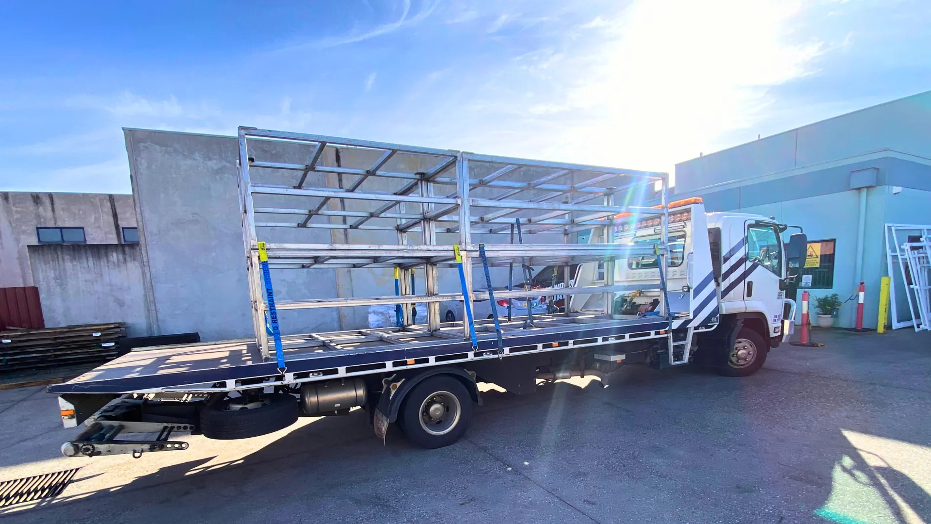 Fabricated steel frame loaded on the All Over Towing tilt tray